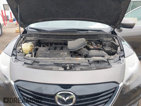 2015 Mazda CX-9 Touring with VIN JM3TB2CA5F0469348, listed as a IAAI auction lot 41516084 with 134,460 mi miles. Bid and sale history available at carsss.com. Image 10.