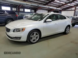 2014 Volvo S60 T5 with VIN YV1612FS5E1285611, listed as a Copart auction lot 66010195 with 156,743 mi miles and Clean title. Bid and sale history available at DreamBid. Image 1.