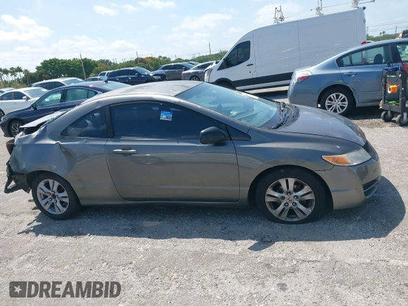 2010 Honda Civic Cpe LX with VIN 2HGFG1B64AH508256, listed as a IAAI auction lot 41974372 with 117,531 mi miles. Bid and sale history available at carsss.com. Image 14.