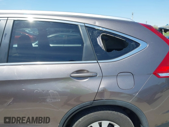 2014 Honda CR-V EX-L with VIN 5J6RM4H70EL096555, listed as a IAAI auction lot 42038062 with 113,601 mi miles. Bid and sale history available at carsss.com. Image 6.