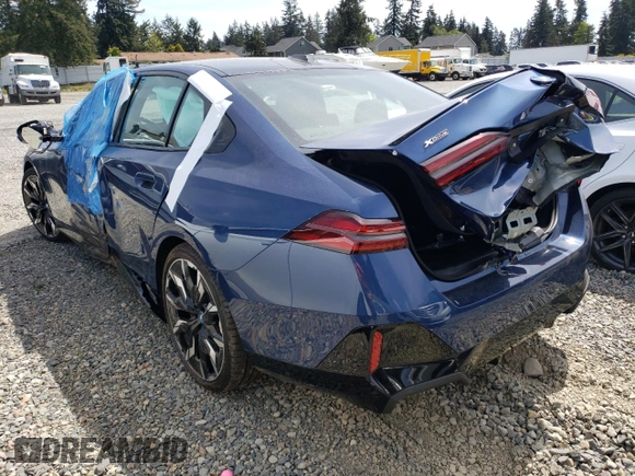 2025 BMW 5 Series with VIN WBA13FK06SCT74610, listed as a Copart auction lot 55362185 with Not provided miles and Salvage title. Bid and sale history available at DreamBid. Image 2.