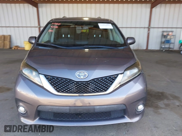 2015 Toyota Sienna SE with VIN 5TDXK3DC1FS667924, listed as a IAAI auction lot 42062805 with 123,504 mi miles. Bid and sale history available at carsss.com. Image 12.