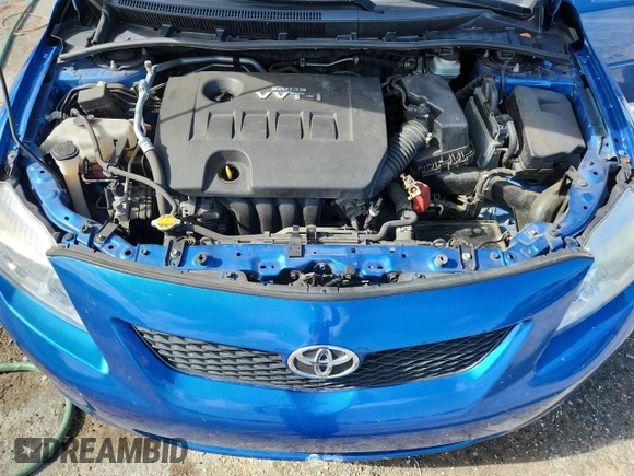 2010 Toyota Corolla z VIN JTDBU4EEXAJ082310, wystawiony jako Copart lot #63019925 z przebiegiem 103 071 mil mil oraz Szkoda całkowita • Salvage title. Historia ofert i sprzedaży dostępna na DreamBid. Obrazek 11.