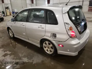 2005 Suzuki Aerio SX z VIN JS2RC61H555300879, wystawiony jako Copart lot #80481084 z przebiegiem 129 196 mil mil oraz Szkody całkowita. Historia ofert i sprzedaży dostępna na DreamBid. Obrazek 2.