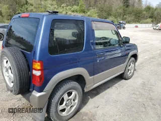 1999 Mitsubishi Montero z VIN H58A0013724, wystawiony jako Copart lot #52986435 z przebiegiem 88 711 mil mil oraz Szkoda całkowita • Salvage title. Historia ofert i sprzedaży dostępna na DreamBid. Obrazek 2.