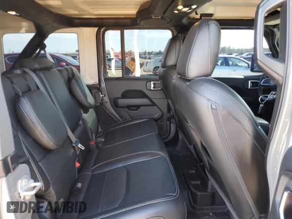 2023 Jeep Wrangler Sahara with VIN 1C4JJXP61PW505122, listed as a Copart auction lot 46719615 with 28,691 mi miles and Salvage Title. Bid and sale history available at DreamBid. Image 11.