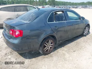 2007 Volkswagen Jetta 2.5 z VIN 3VWRF71K67M131095, wystawiony jako IAAI lot #42561971 z przebiegiem 127 592 mil mil oraz . Historia ofert i sprzedaży dostępna na DreamBid. Obrazek 4.