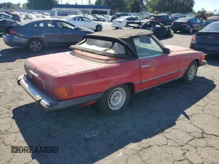 1985 Mercedes-Benz SL with VIN WDBBA45C9FA017476, listed as a Copart auction lot 74177774 with 135,805 mi miles and Salvage title. Bid and sale history available at DreamBid. Image 3.