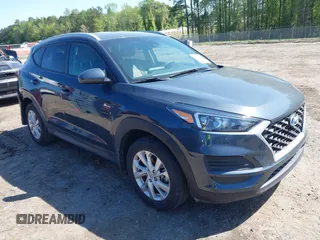2019 Hyundai Tucson Value z VIN KM8J33A45KU058949, wystawiony jako IAAI lot #41999747 z przebiegiem 64 125 mil mil oraz . Historia ofert i sprzedaży dostępna na DreamBid. Obrazek 1.