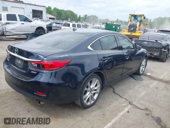 2016 Mazda Mazda6 i Touring with VIN JM1GJ1V59G1402867, listed as a IAAI auction lot 41998212 with 135,724 mi miles. Bid and sale history available at carsss.com. Image 4.