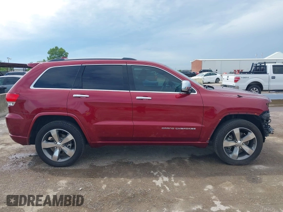 2015 Jeep Grand Cherokee Overland z VIN 1C4RJFCT1FC198611, wystawiony jako IAAI lot #42427311 z przebiegiem 116 140 mil mil oraz . Historia ofert i sprzedaży dostępna na DreamBid. Obrazek 14.