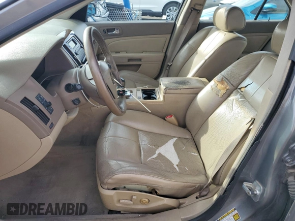 2005 Cadillac STS with VIN 1G6DW677950223170, listed as a Copart auction lot 43663725 with 237,730 mi miles and Salvage Title. Bid and sale history available at DreamBid. Image 7.