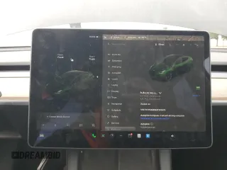 2021 Tesla Model Y Long Range z VIN 5YJYGAEE5MF143672, wystawiony jako Copart lot #55962875 z przebiegiem 74 644 mil mil oraz Szkoda całkowita • Salvage title. Historia ofert i sprzedaży dostępna na DreamBid. Obrazek 9.