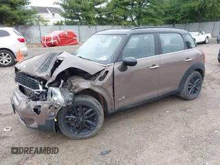 2014 MINI Countryman S with VIN WMWZC5C55EWP41717, listed as a IAAI auction lot 42324347 with Not provided miles and . Bid and sale history available at DreamBid. Image 18.