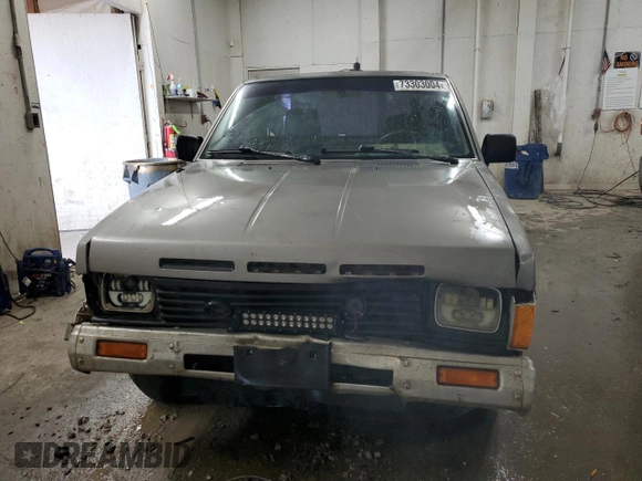 1987 Nissan Hardbody E с VIN JN6ND11S3HW057122, выставлен на аукционе Copart как лот 73303004 с пробегом 233 309 миль миль и Списание • Salvage title. История ставок и продаж доступна на DreamBid. Изображение 5.