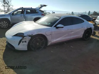 2021 Porsche Taycan with VIN WP0AA2Y1XMSA14883, listed as a Copart auction lot 84034714 with 28,008 mi miles and Salvage Title. Bid and sale history available at DreamBid. Image 1.