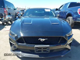 2019 Ford Mustang GT Premium z VIN 1FATP8FF5K5193437, wystawiony jako IAAI lot #42608815 z przebiegiem 67 115 mil mil oraz . Historia ofert i sprzedaży dostępna na DreamBid. Obrazek 12.