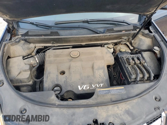 2016 Cadillac SRX Performance Collection with VIN 3GYFNCE32GS507625, listed as a Copart auction lot 61575625 with 47,427 mi miles and Salvage title. Bid and sale history available at DreamBid. Image 12.