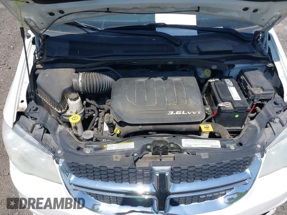 2012 Dodge Grand Caravan SXT with VIN 2C4RDGCG9CR200432, listed as a IAAI auction lot 42027477 with 99,076 mi miles and . Bid and sale history available at DreamBid. Image 10.