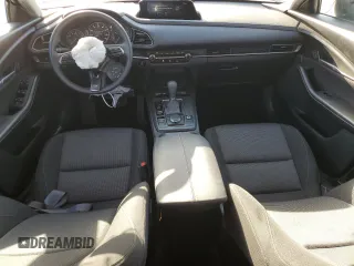2024 Mazda CX-30 S with VIN 3MVDMBAM2RM675084, listed as a Copart auction lot 47735965 with 11,611 mi miles and Salvage Title. Bid and sale history available at DreamBid. Image 8.