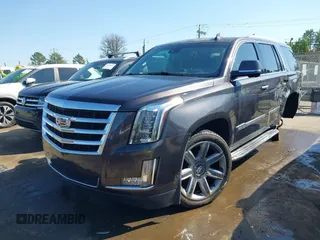 2015 Cadillac Escalade Luxury z VIN 1GYS3MKJ2FR518865, wystawiony jako IAAI lot #41890235 z przebiegiem 156 849 mil mil oraz . Historia ofert i sprzedaży dostępna na DreamBid. Obrazek 18.