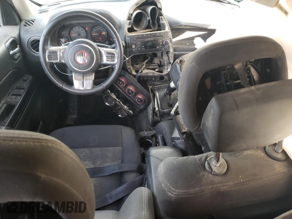 2014 Jeep Patriot Latitude with VIN 1C4NJRFB4ED892754, listed as a Copart auction lot 46517945 with 161,042 mi miles and Salvage title. Bid and sale history available at DreamBid. Image 8.