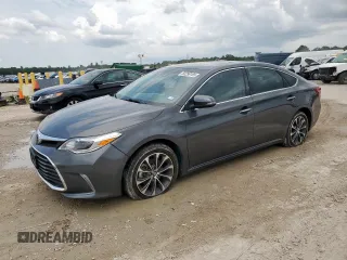 2018 Toyota Avalon XLE z VIN 4T1BK1EB4JU279638, wystawiony jako Copart lot #60290185 z przebiegiem 57 957 mil mil oraz Szkoda całkowita • Salvage title. Historia ofert i sprzedaży dostępna na DreamBid. Obrazek 1.