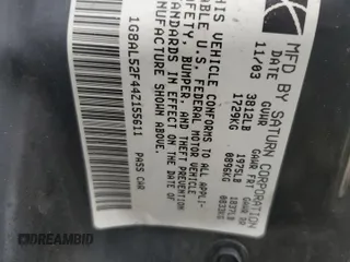 2004 Saturn ION ION 3 z VIN 1G8AL52F44Z155611, wystawiony jako Copart lot #72727944 z przebiegiem 68 419 mil mil oraz Szkoda całkowita • Salvage title. Historia ofert i sprzedaży dostępna na DreamBid. Obrazek 14.
