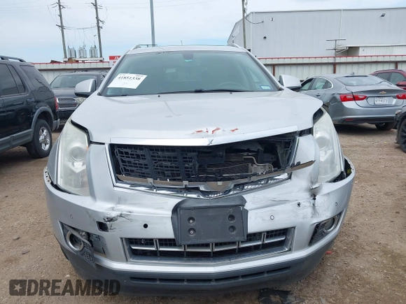 2015 Cadillac SRX Performance Collection z VIN 3GYFNCE36FS633386, wystawiony jako IAAI lot #41851338 z przebiegiem 102 586 mil mil oraz . Historia ofert i sprzedaży dostępna na DreamBid. Obrazek 12.