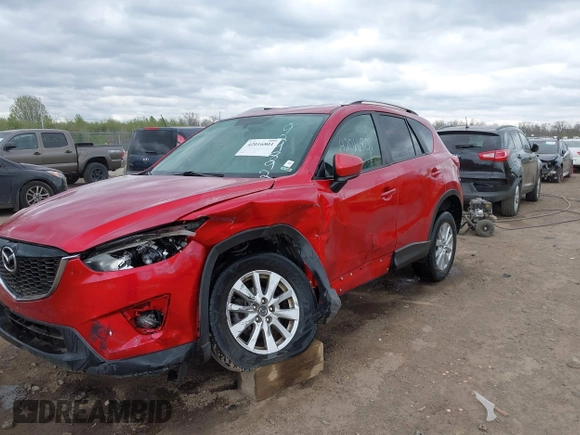 2014 Mazda CX-5 Touring z VIN JM3KE2CY3E0424892, wystawiony jako IAAI lot #42016801 z przebiegiem 173 350 mil mil oraz . Historia ofert i sprzedaży dostępna na DreamBid. Obrazek 6.
