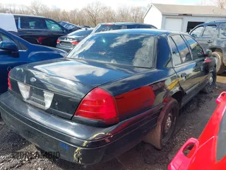 2009 Ford Police Interceptor with VIN 2FAHP71V59X110550, listed as a IAAI auction lot 41640643 with 184,461 mi miles and . Bid and sale history available at DreamBid. Image 4.