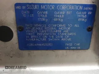 2004 Suzuki Aerio z VIN JS2RD61H645252322, wystawiony jako Copart lot #89144955 z przebiegiem 178 866 mil mil oraz Szkoda całkowita • Salvage title. Historia ofert i sprzedaży dostępna na DreamBid. Obrazek 13.