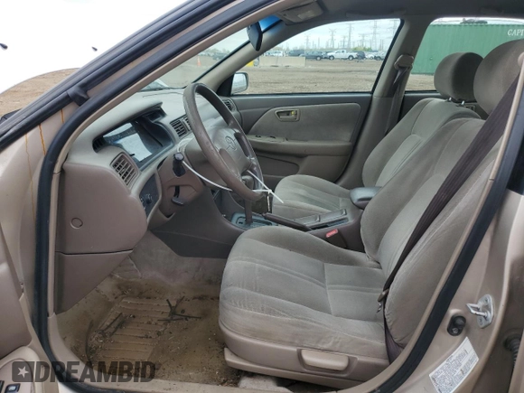 2000 Toyota Camry CE z VIN 4T1BG22K6YU991932, wystawiony jako Copart lot #55588155 z przebiegiem 188 363 mil mil oraz Szkoda całkowita • Salvage title. Historia ofert i sprzedaży dostępna na DreamBid. Obrazek 7.