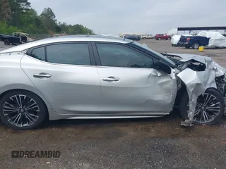 2016 Nissan Maxima SV z VIN 1N4AA6AP1GC904065, wystawiony jako IAAI lot #41930372 z przebiegiem 172 376 mil mil oraz . Historia ofert i sprzedaży dostępna na DreamBid. Obrazek 14.