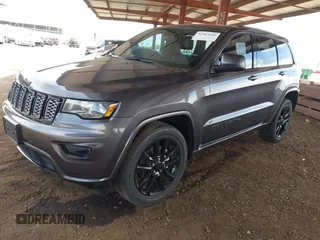 2018 Jeep Grand Cherokee Altitude with VIN 1C4RJFAG1JC190670, listed as a IAAI auction lot 42363456 with 110,848 mi miles and . Bid and sale history available at DreamBid. Image 17.
