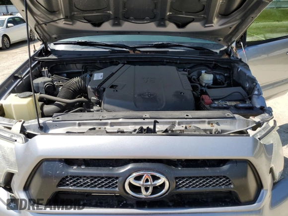 2015 Toyota Tacoma z VIN 5TFLU4EN5FX135486, wystawiony jako Copart lot #58320245 z przebiegiem 95 424 mil mil oraz Szkoda całkowita • Salvage title. Historia ofert i sprzedaży dostępna na DreamBid. Obrazek 11.