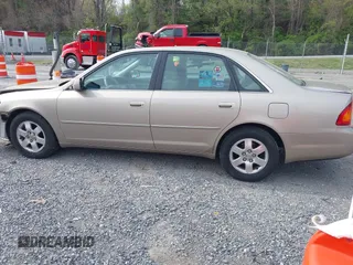 2000 Toyota Avalon XL with VIN 4T1BF28BXYU070808, listed as a IAAI auction lot 42061893 with 228,229 mi miles and . Bid and sale history available at DreamBid. Image 14.