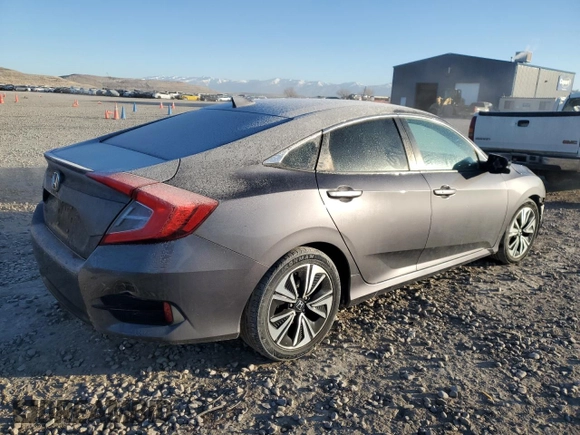 2016 Honda Civic EX-T z VIN 2HGFC1F3XGH647117, wystawiony jako Copart lot #89222095 z przebiegiem 86 895 mil mil oraz Szkoda całkowita • Salvage title. Historia ofert i sprzedaży dostępna na DreamBid. Obrazek 3.