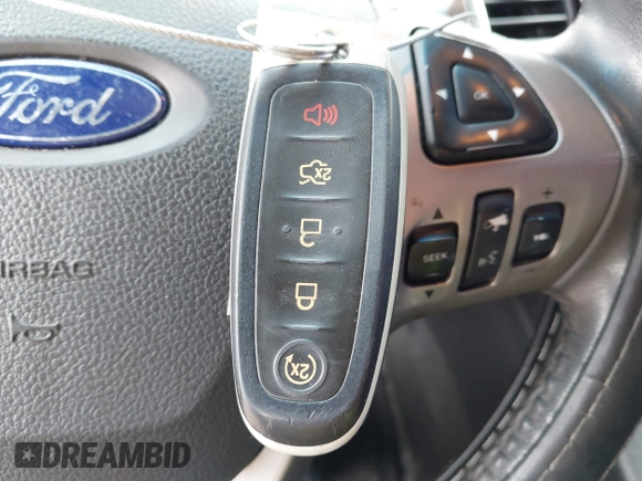 2015 Ford Taurus Limited with VIN 1FAHP2J84FG110702, listed as a IAAI auction lot 42060437 with 208,012 mi miles. Bid and sale history available at carsss.com. Image 11.