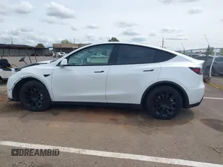 2022 Tesla Model Y Long Range with VIN 7SAYGDEE2NF403354, listed as a IAAI auction lot 41986216 with 53,177 mi miles and . Bid and sale history available at DreamBid. Image 14.