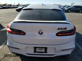 2020 BMW X4 M Competition z VIN 5YMUJ0C01L9C90351, wystawiony jako Copart lot #79907904 z przebiegiem Nie podano mil oraz Szkoda całkowita • Salvage title. Historia ofert i sprzedaży dostępna na DreamBid. Obrazek 6.