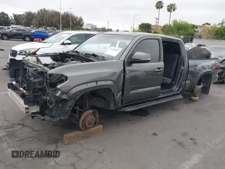 2017 Toyota Tacoma SR5 with VIN 3TMDZ5BN1HM021526, listed as a IAAI auction lot 42204091 with 82,802 mi miles and . Bid and sale history available at DreamBid. Image 6.