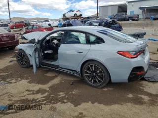 2022 BMW 4 Series M440i xDrive with VIN WBA13AW0XNFM27700, listed as a Copart auction lot 48406425 with Not provided miles and Salvage title. Bid and sale history available at DreamBid. Image 2.