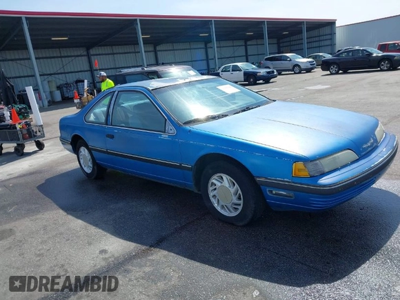 1990 Ford Thunderbird with VIN 1FAPP6248LH206157, listed as a IAAI auction lot 41915948 with 165,340 mi miles and . Bid and sale history available at DreamBid. Image 1.