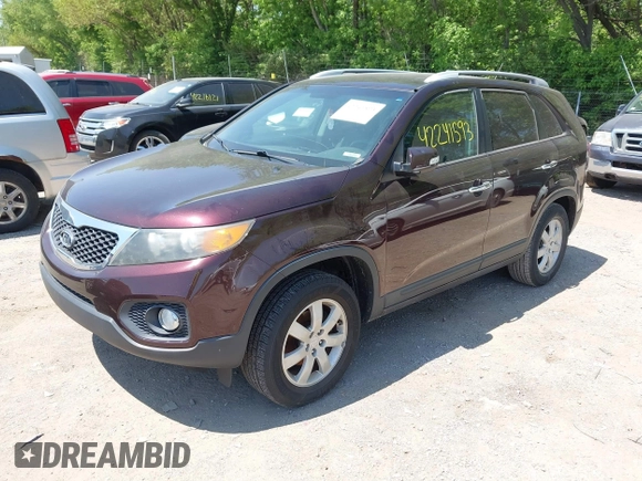2012 Kia Sorento LX with VIN 5XYKT4A27CG195861, listed as a IAAI auction lot 42241593 with 175,282 mi miles and . Bid and sale history available at carsss.com. Image 2.