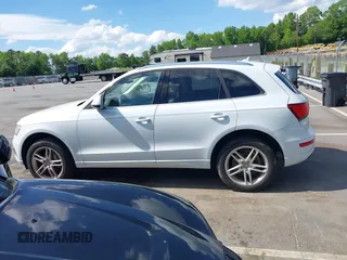 2014 Audi Q5 Premium Plus z VIN WA1LFAFP8EA081587, wystawiony jako IAAI lot #42195922 z przebiegiem 143 540 mil mil oraz . Historia ofert i sprzedaży dostępna na DreamBid. Obrazek 14.