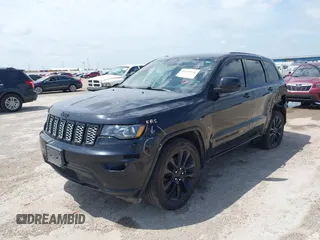 2019 Jeep Grand Cherokee Altitude with VIN 1C4RJEAG0KC857787, listed as a IAAI auction lot 42434646 with 193,968 mi miles and . Bid and sale history available at DreamBid. Image 17.