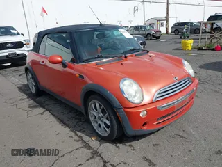 2005 MINI Convertible with VIN WMWRF33485TF60893, listed as a IAAI auction lot 41831159 with 92,184 mi miles and . Bid and sale history available at DreamBid. Image 1.