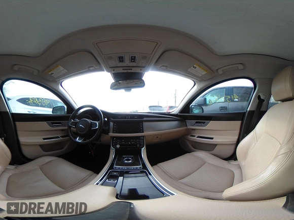 2018 Jaguar XF with VIN SAJBE4EV5JCY56577, listed as a IAAI auction lot 41520046 with 90,307 mi miles and . Bid and sale history available at DreamBid. Image 18.
