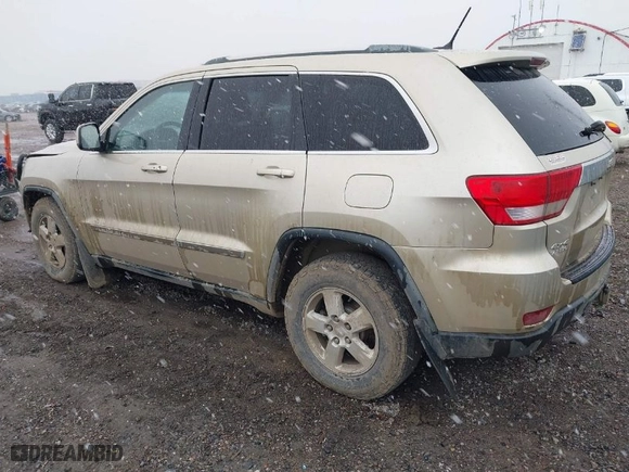 2011 Jeep Grand Cherokee Laredo with VIN 1J4RR4GG9BC563065, listed as a IAAI auction lot 41798136 with 192,149 mi miles. Bid and sale history available at carsss.com. Image 3.